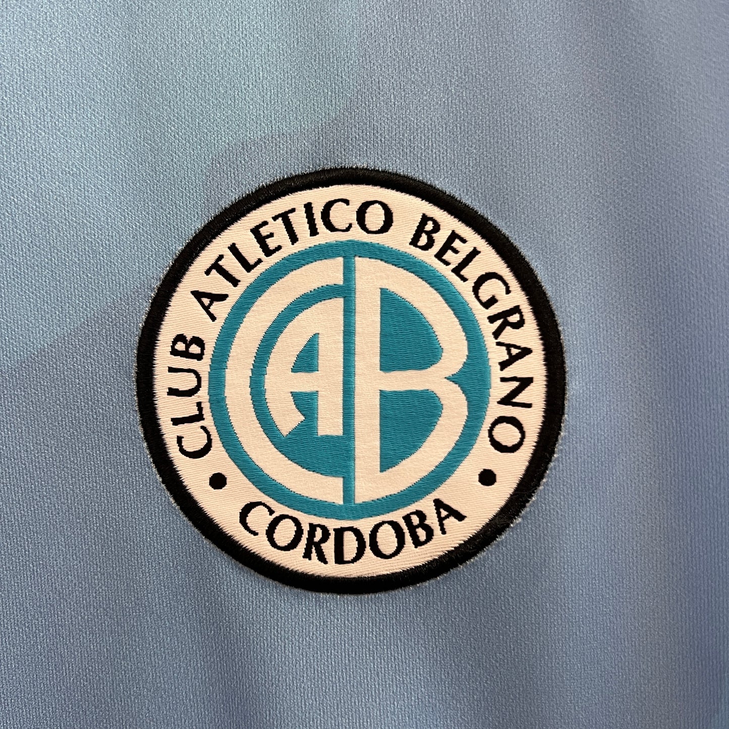 CAMISETA PRIMERA EQUIPACIÓN BELGRANO 2024 VERSIÓN FAN