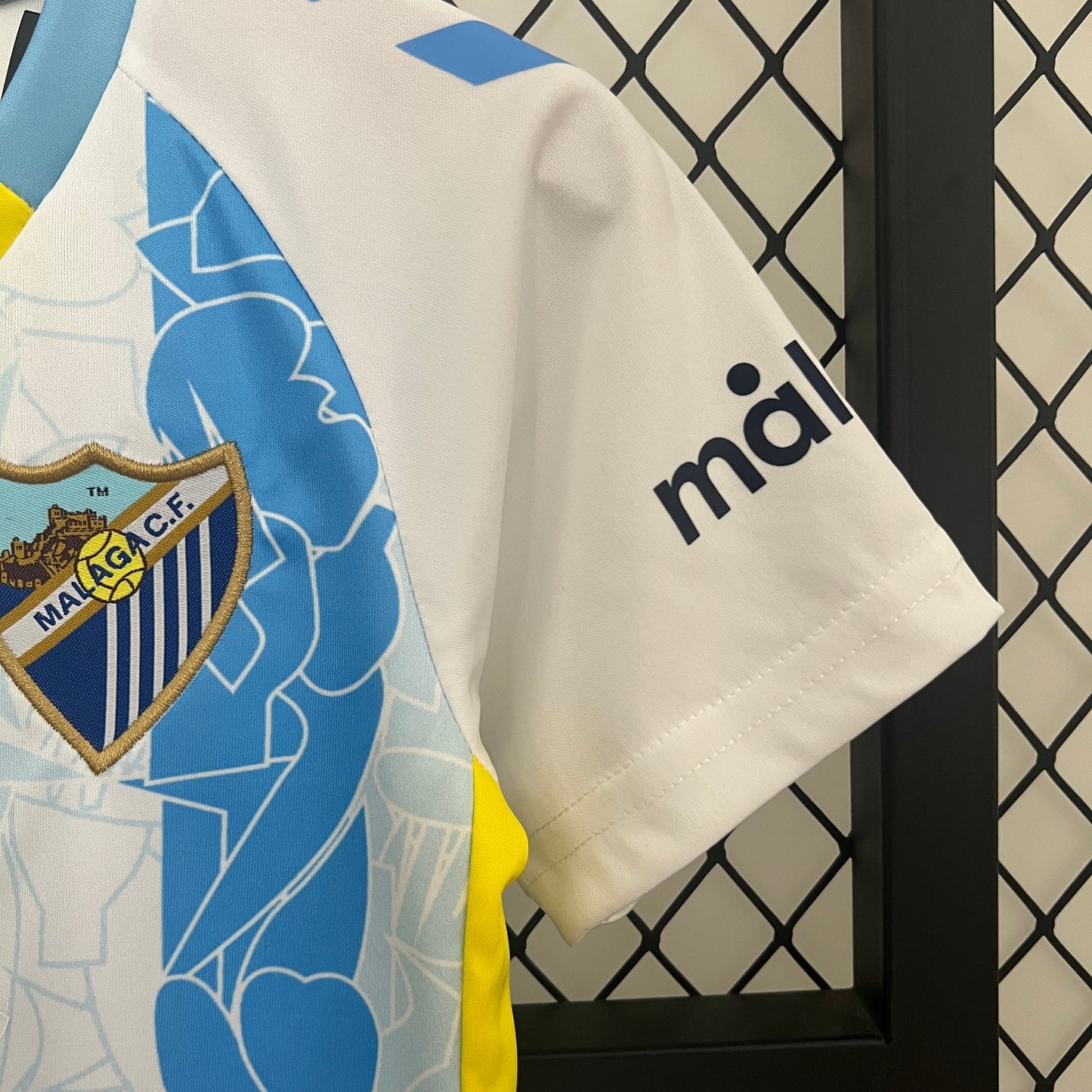 CAMISETA PRIMERA EQUIPACIÓN MÁLAGA 24/25 VERSIÓN INFANTIL