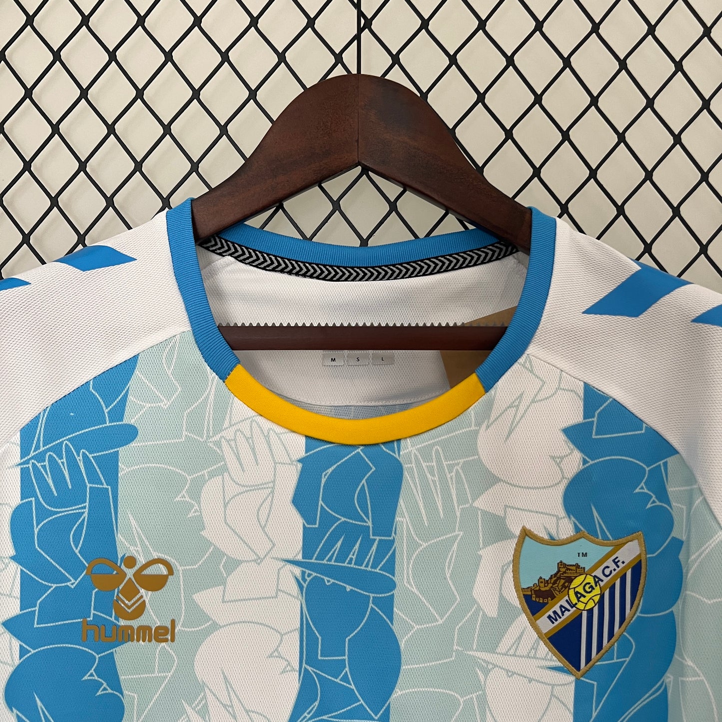 CAMISETA PRIMERA EQUIPACIÓN MÁLAGA 24/25 VERSIÓN FAN