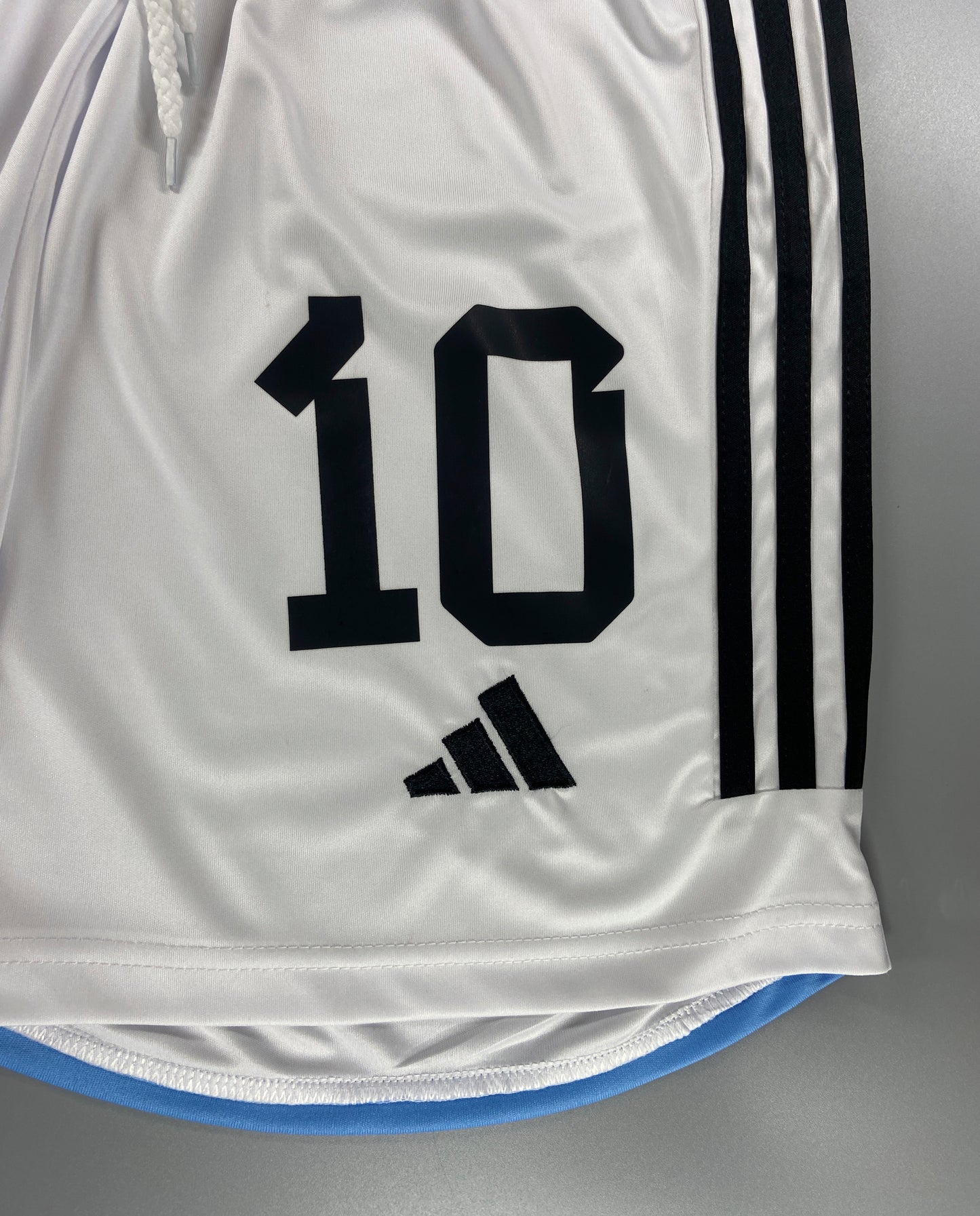 SHORTS PRIMERA EQUIPACIÓN ARGENTINA 2022