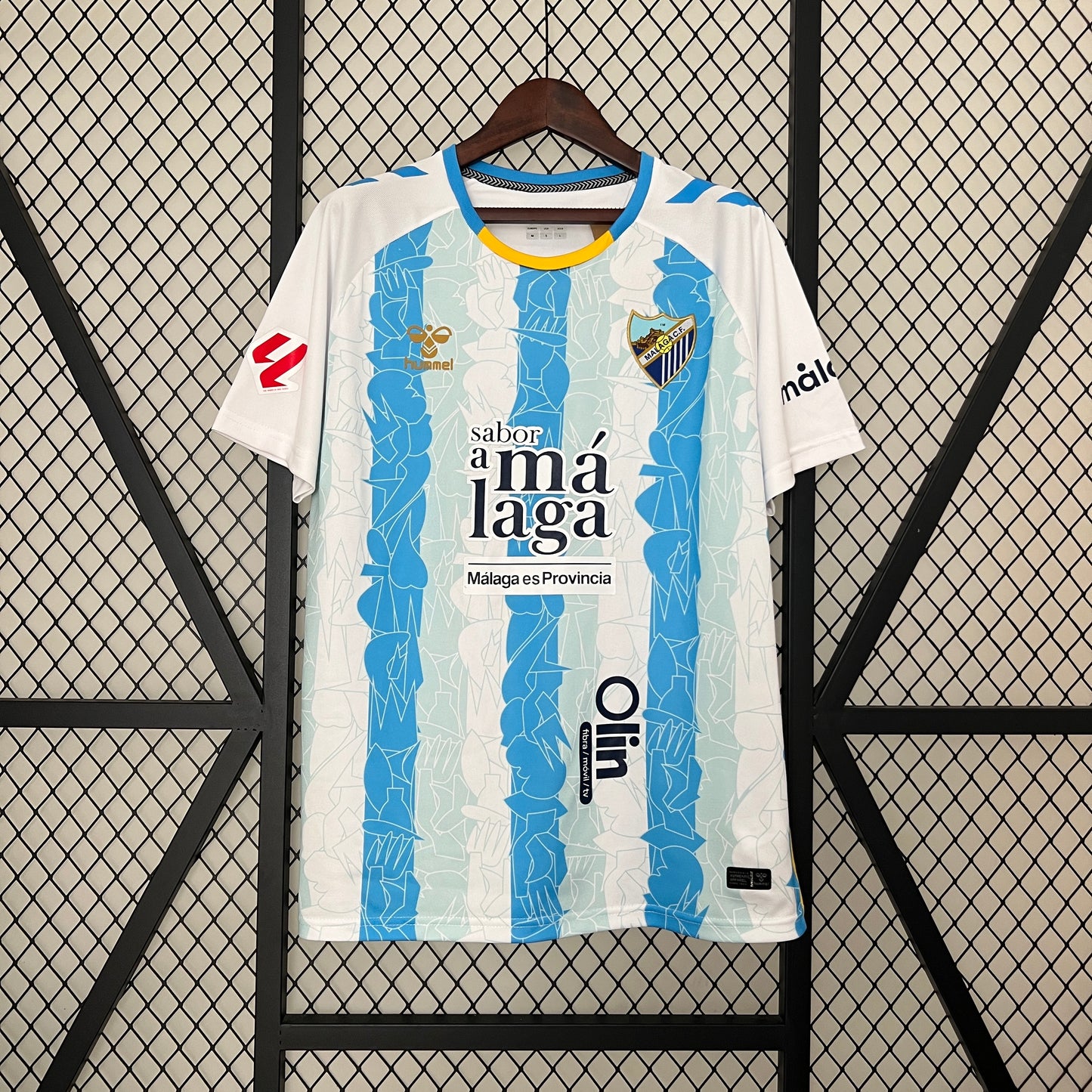 CAMISETA PRIMERA EQUIPACIÓN MÁLAGA 24/25 VERSIÓN FAN