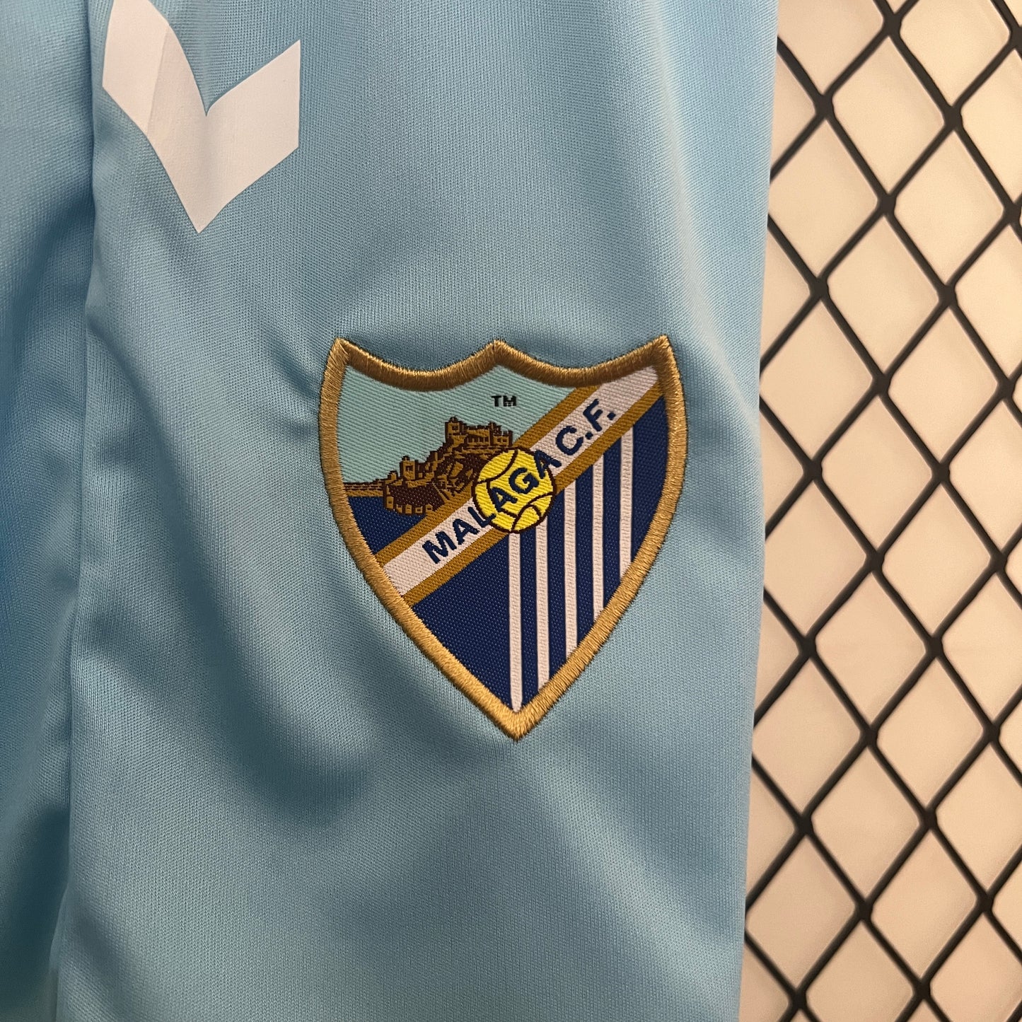 CAMISETA PRIMERA EQUIPACIÓN MÁLAGA 24/25 VERSIÓN INFANTIL