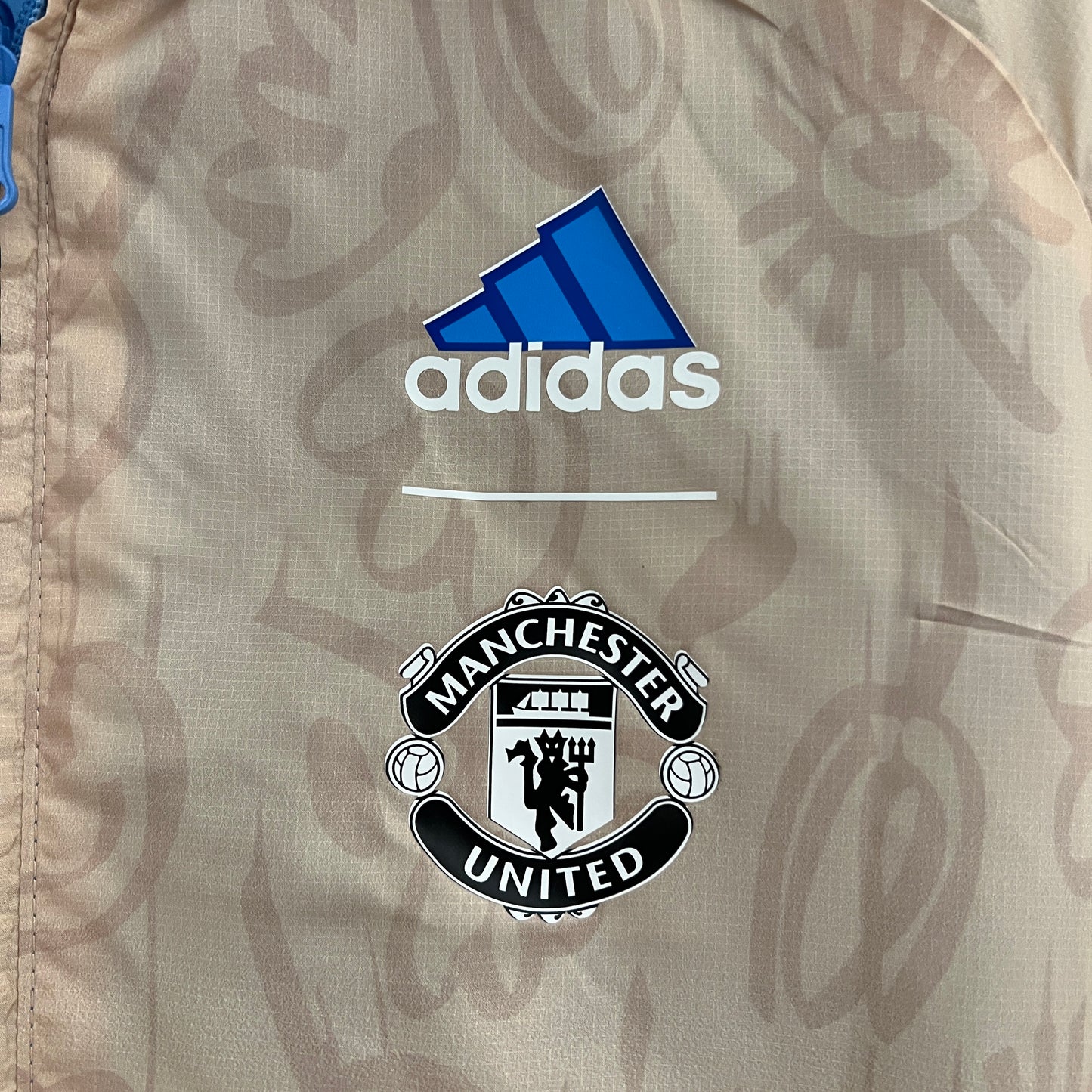 CORTAVIENTOS MANCHESTER UNITED REVERSIBLE