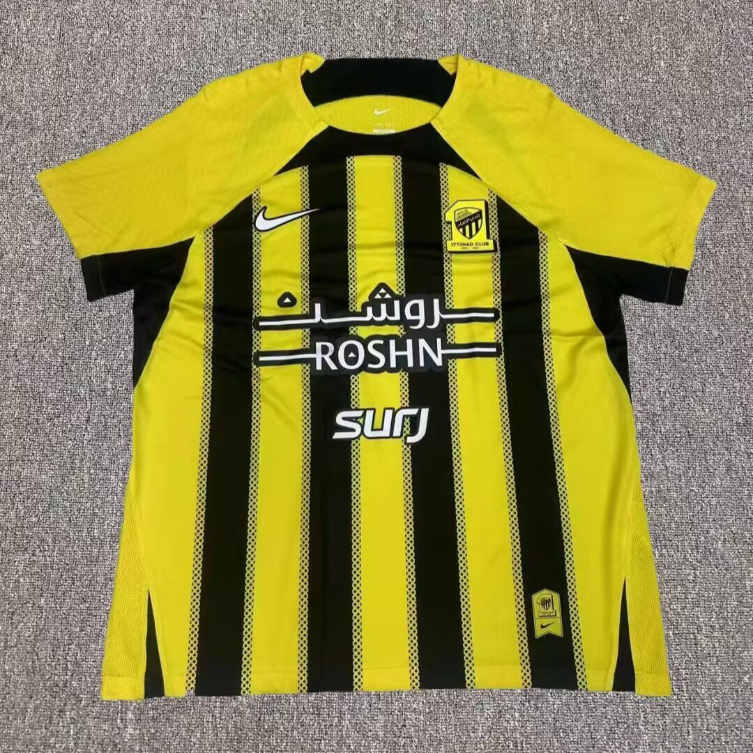 CAMISETA PRIMERA EQUIPACIÓN AL ITTIHAD 24/25 VERSIÓN FAN