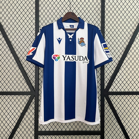 CAMISETA PRIMERA EQUIPACIÓN REAL SOCIEDAD 24/25 VERSIÓN FAN