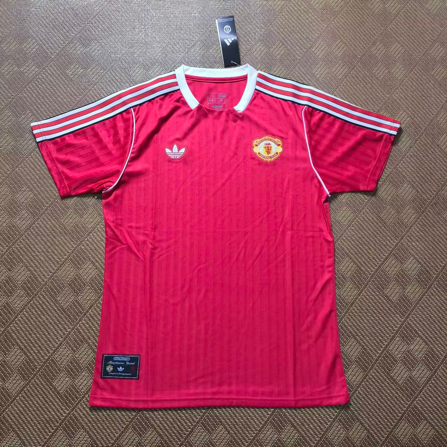 POLERA DE SALIDA MANCHESTER UNITED 24/25 VERSIÓN FAN