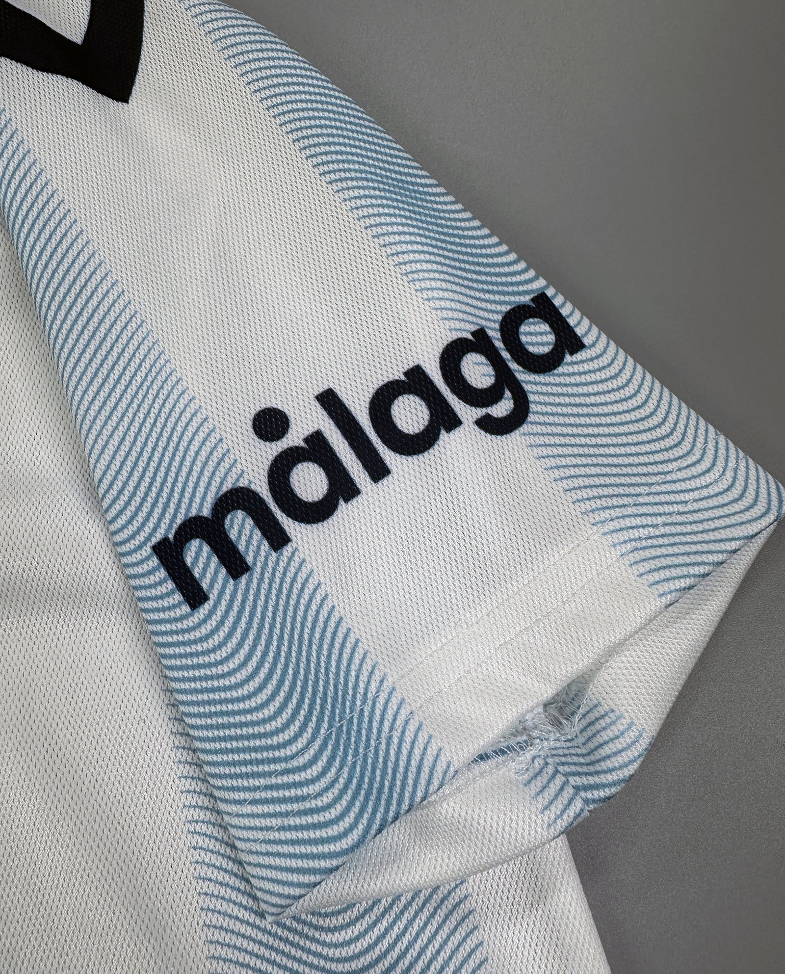 CAMISETA PRIMERA EQUIPACIÓN MÁLAGA 23/24 VERSIÓN INFANTIL - Imagen 6