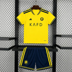 CAMISETA PRIMERA EQUIPACIÓN AL NASSR 2026/27 VERSIÓN INFANTIL
