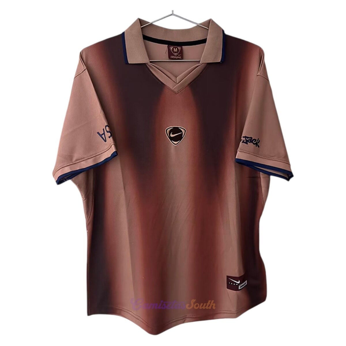 CAMISETA ESTADOS UNIDOS NIKE TOTAL 90 x CACTUS JACK TRAVIS SCOTT 2026 VERSIÓN FAN